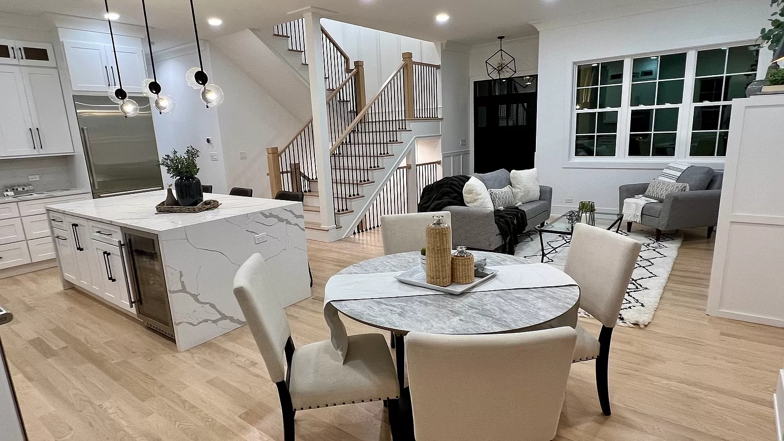 Open kitchen and living room renovation with cohesive materials